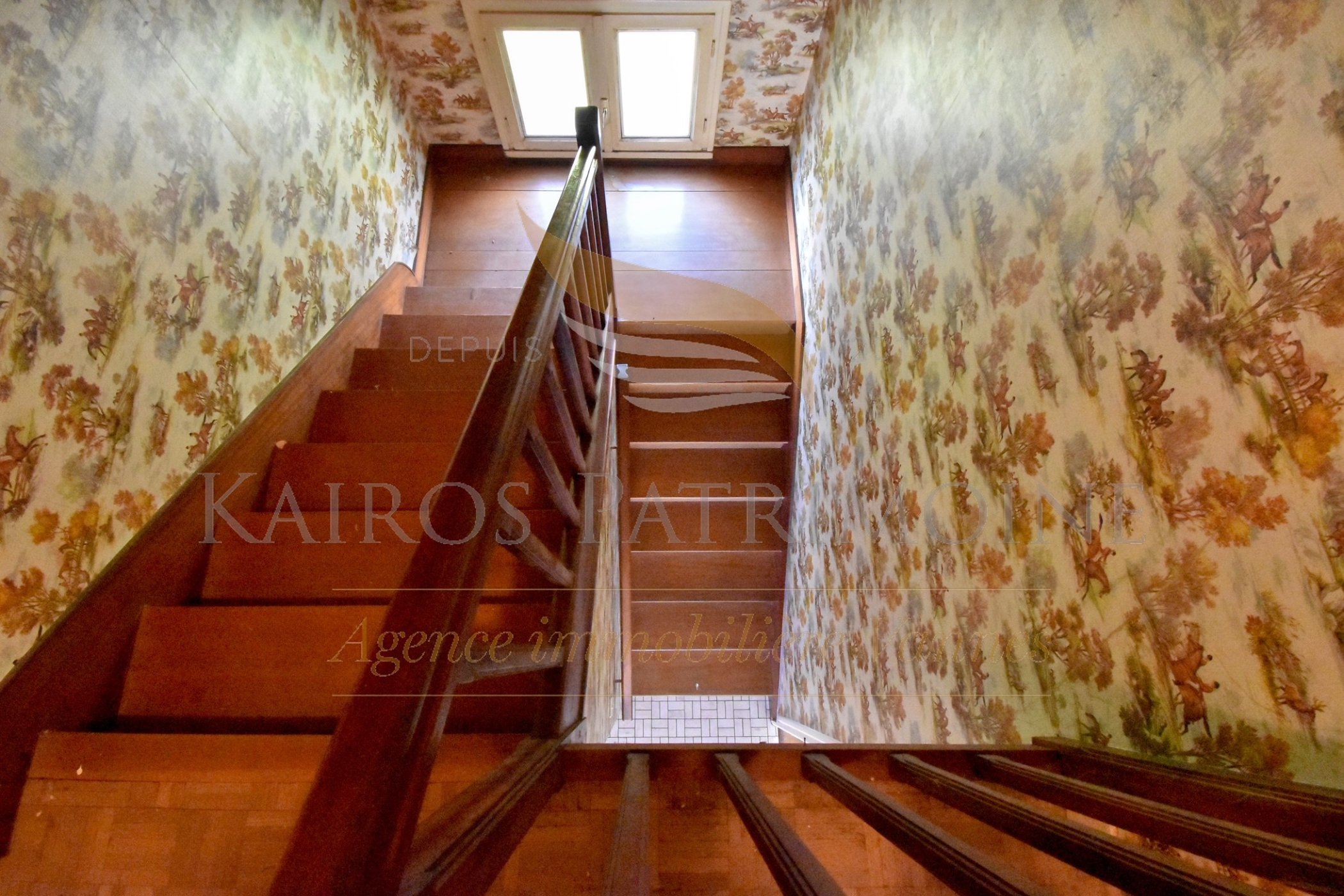 Achat vente maison Grand Champ Kairos patrimoine Escalier